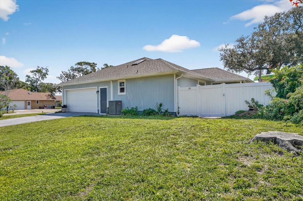 24 Heather Lane Ormond Beach, FL 32174 - Photo 8 of 50 a view of a house with a yard