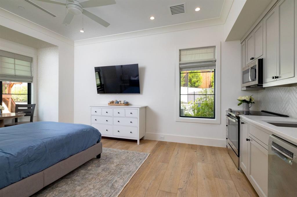 1412 Chelsea Rae Lane Keller, TX 76262 - Photo 22 of 40 This multigenerational flex space has a spacious room, kitchen, en-suite, washer and dryer, and it's own entrance!