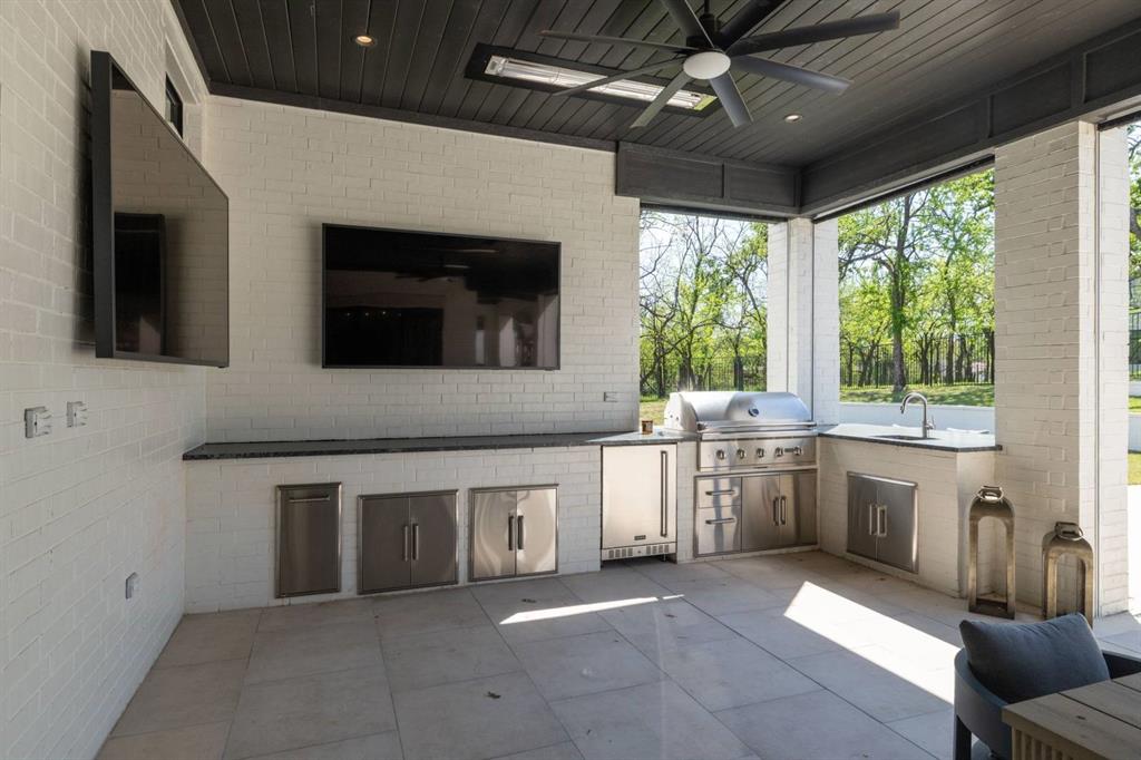 1412 Chelsea Rae Lane Keller, TX 76262 - Photo 35 of 40 Back patio ready to entertain or sit with you morning coffee! Has built in heaters and screens that come down to enclose the space