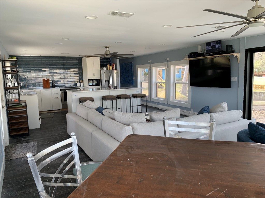 1713 Aztec Kingsland, TX 78639 - Photo 5 of 12 a living room with furniture and a flat screen tv