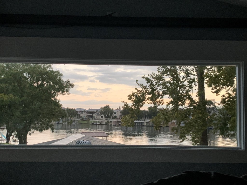 1713 Aztec Kingsland, TX 78639 - Photo 9 of 12 a view of a lake from a balcony