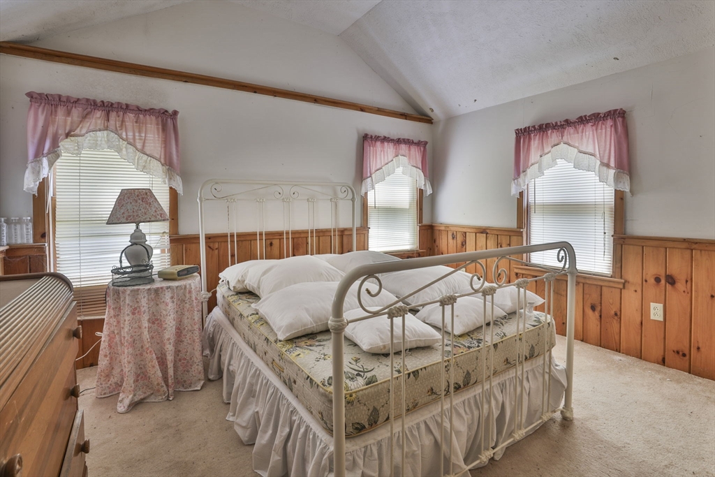 100 Stodge Meadow Road Ashburnham, MA 01430 - Photo 15 of 17 a bedroom with a bed next to a window
