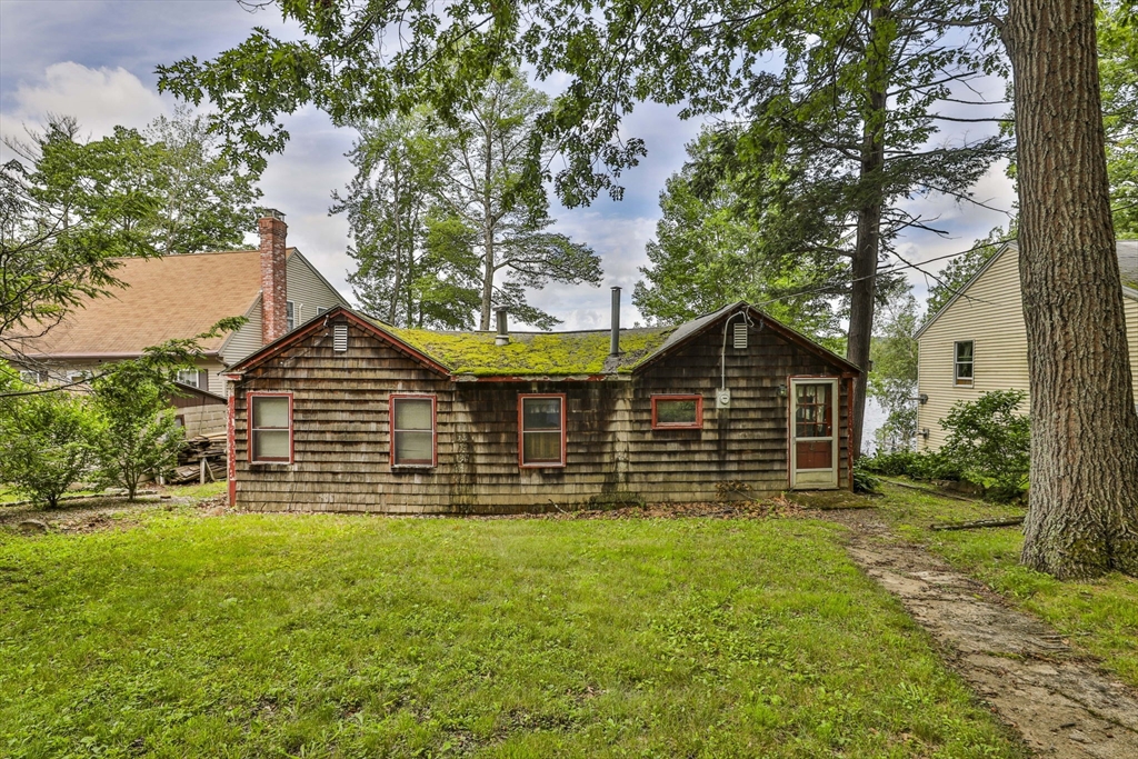 100 Stodge Meadow Road Ashburnham, MA 01430 - Photo 2 of 17 a front view of a house with a yard