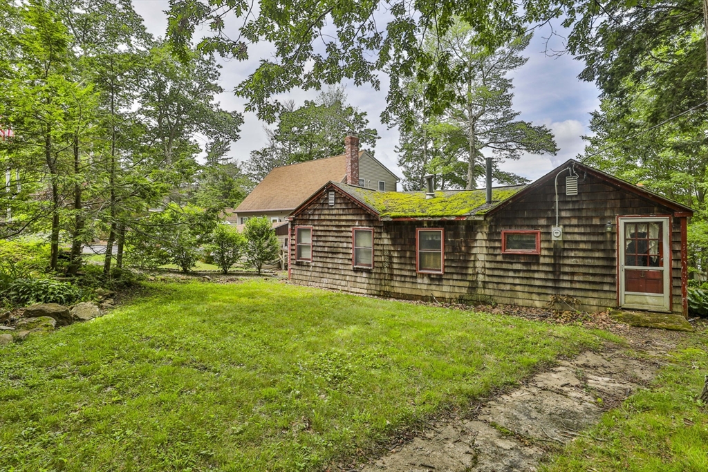 100 Stodge Meadow Road Ashburnham, MA 01430 - Photo 3 of 17 a front view of a house with garden