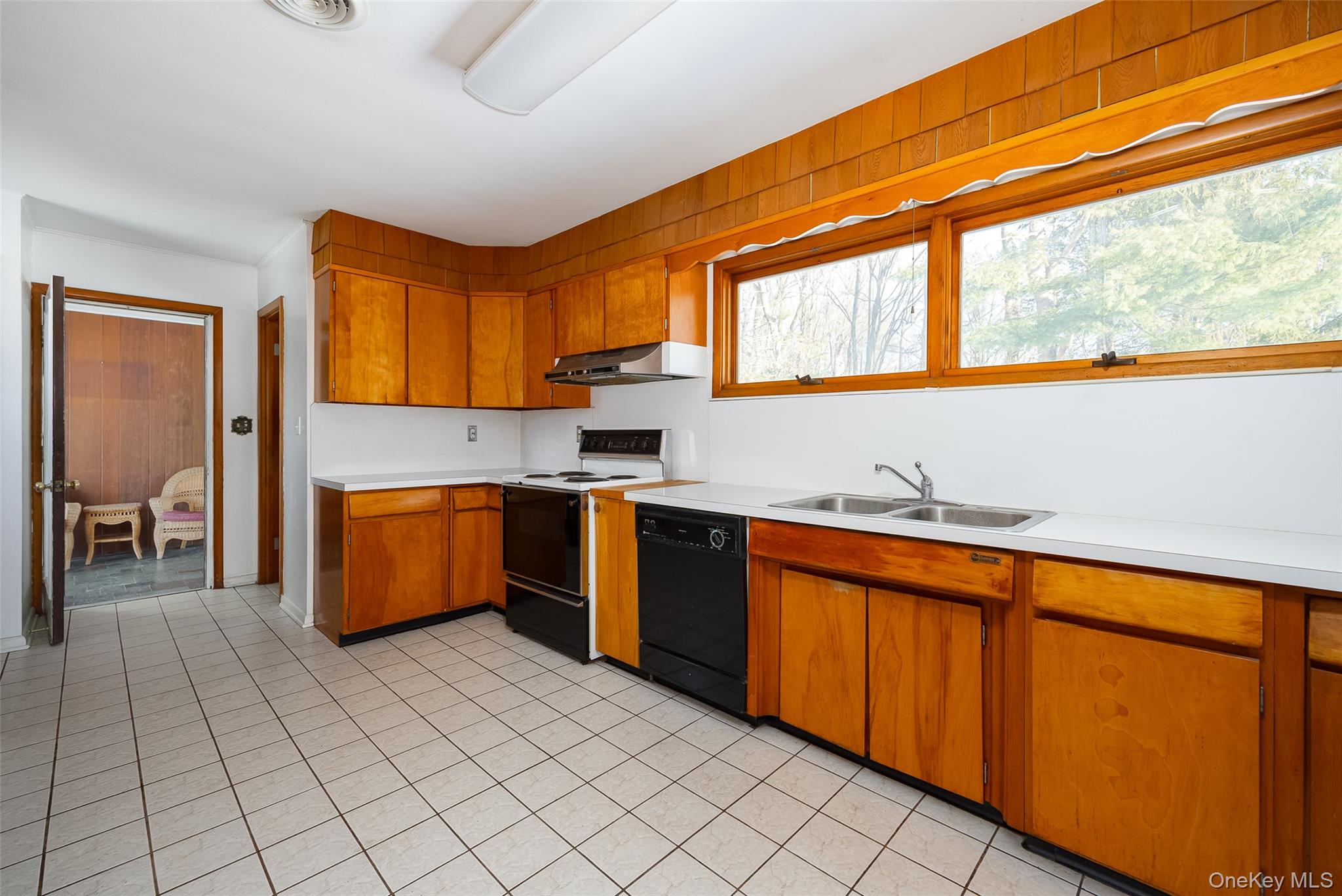 201 Linden Avenue Red Hook, NY 12571 - Photo 5 of 34 a kitchen with stainless steel appliances a sink window and cabinets