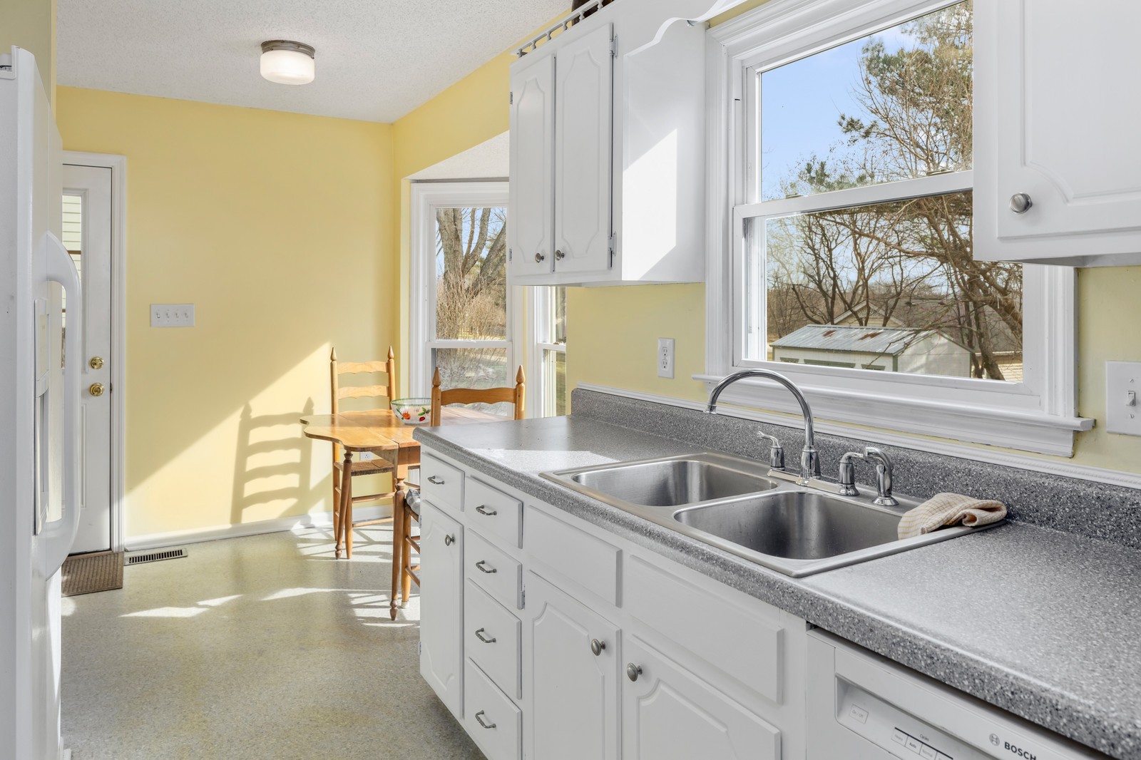 704 Riverview Drive Franklin, TN 37064 - Photo 16 of 33 a kitchen with stainless steel appliances a sink and a window