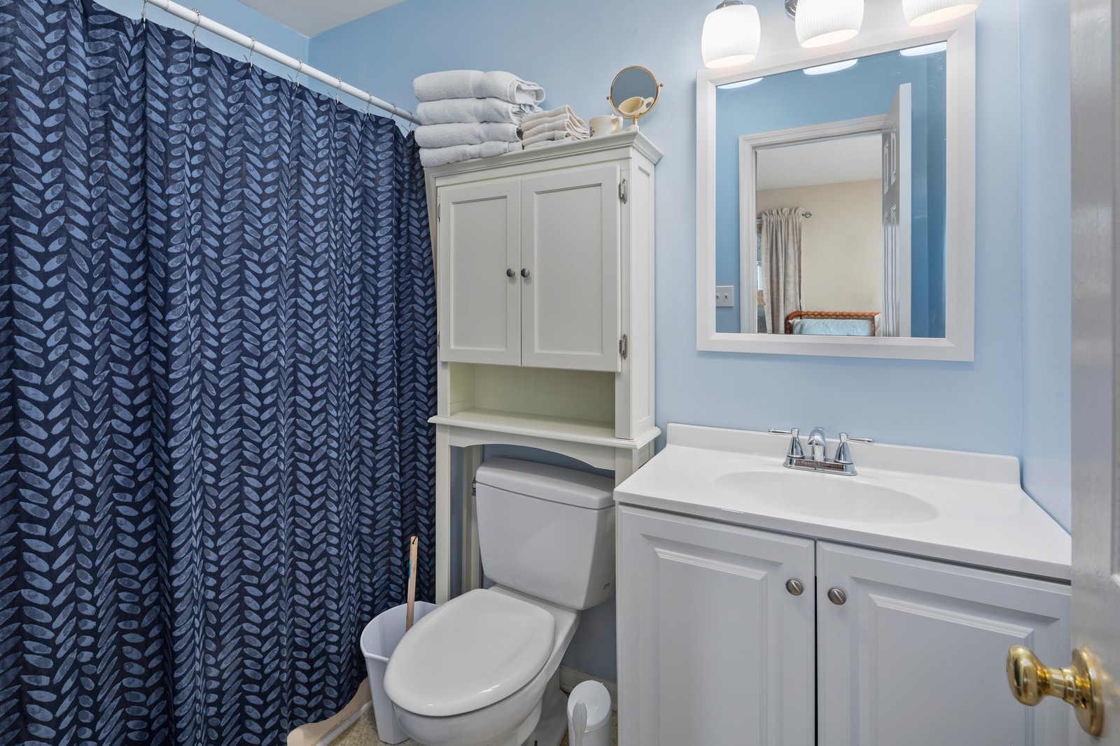 704 Riverview Drive Franklin, TN 37064 - Photo 25 of 33 a bathroom with a toilet sink vanity and mirror