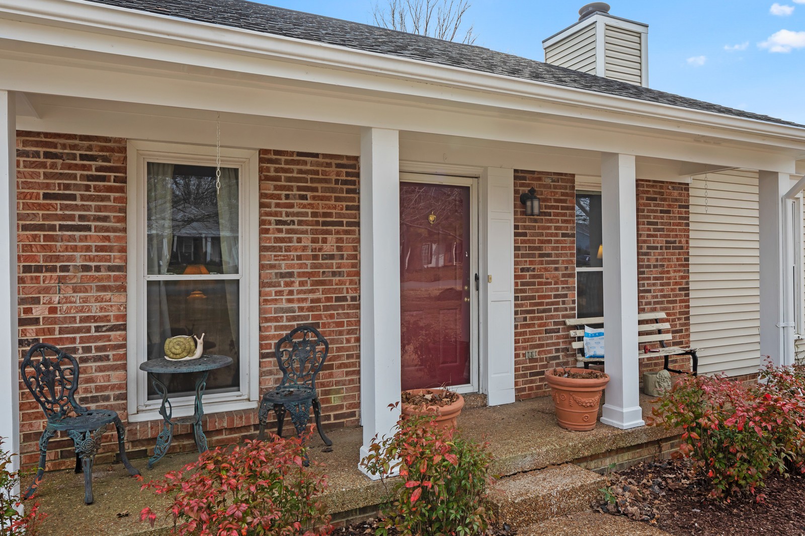704 Riverview Drive Franklin, TN 37064 - Photo 4 of 33 a front view of a house with a plants
