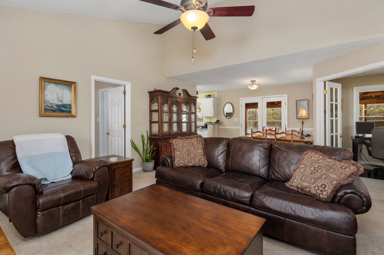 704 Riverview Drive Franklin, TN 37064 - Photo 8 of 33 a living room with furniture and a chandelier
