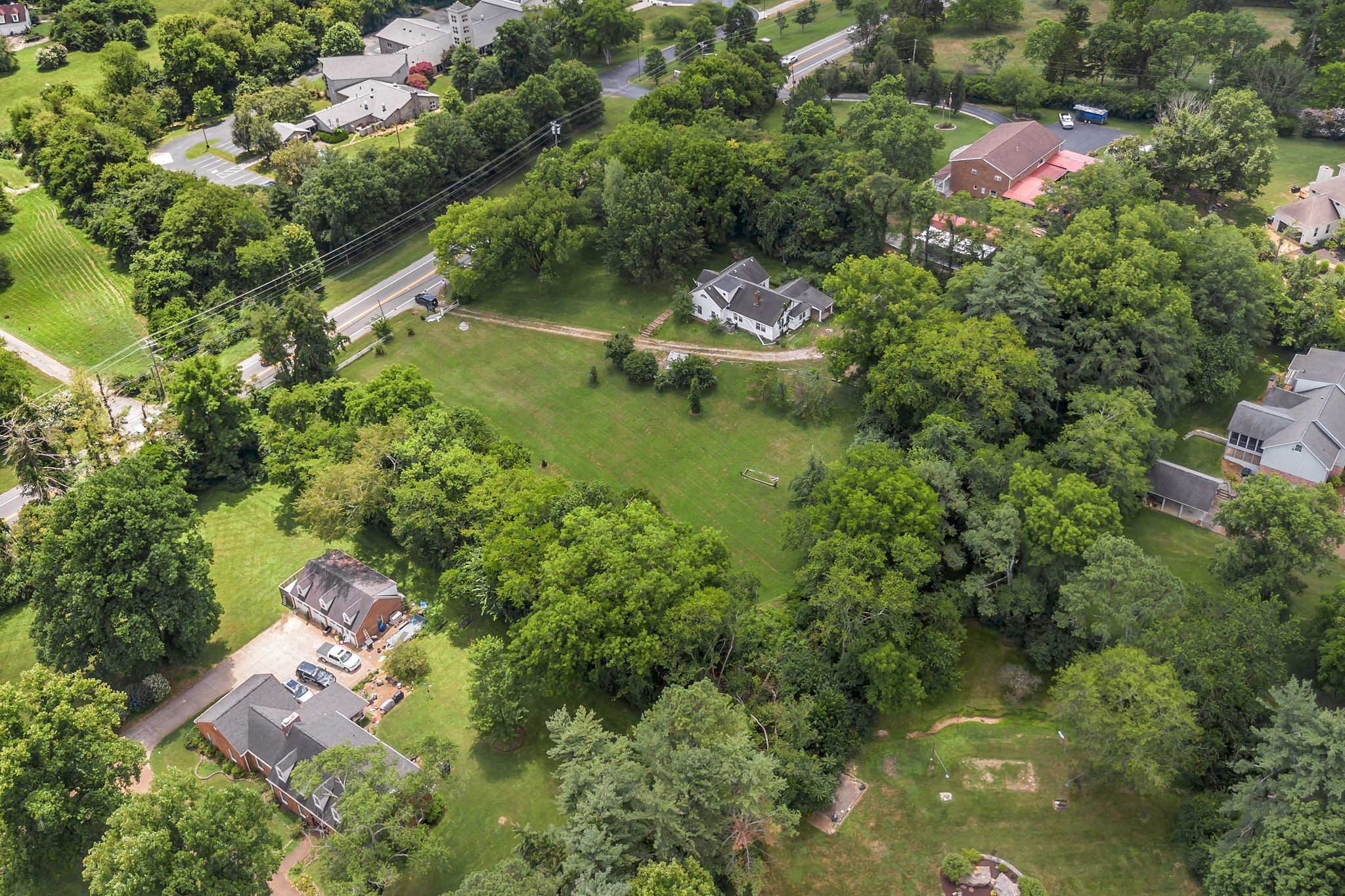 517 Franklin Road Franklin, TN 37069 - Photo 11 of 28 an aerial view of residential house with outdoor space and trees all around