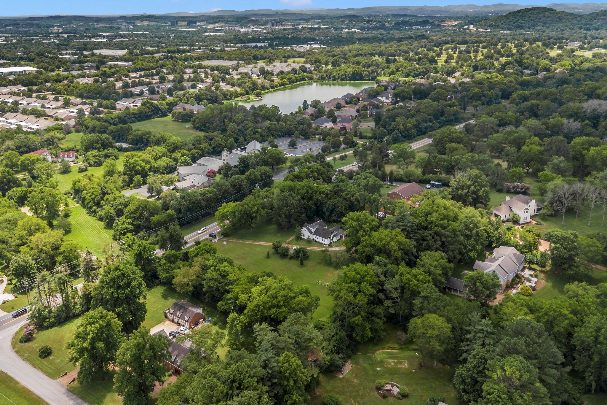 517 Franklin Road Franklin, TN 37069 - Photo 12 of 28 an aerial view of residential houses with outdoor space and trees
