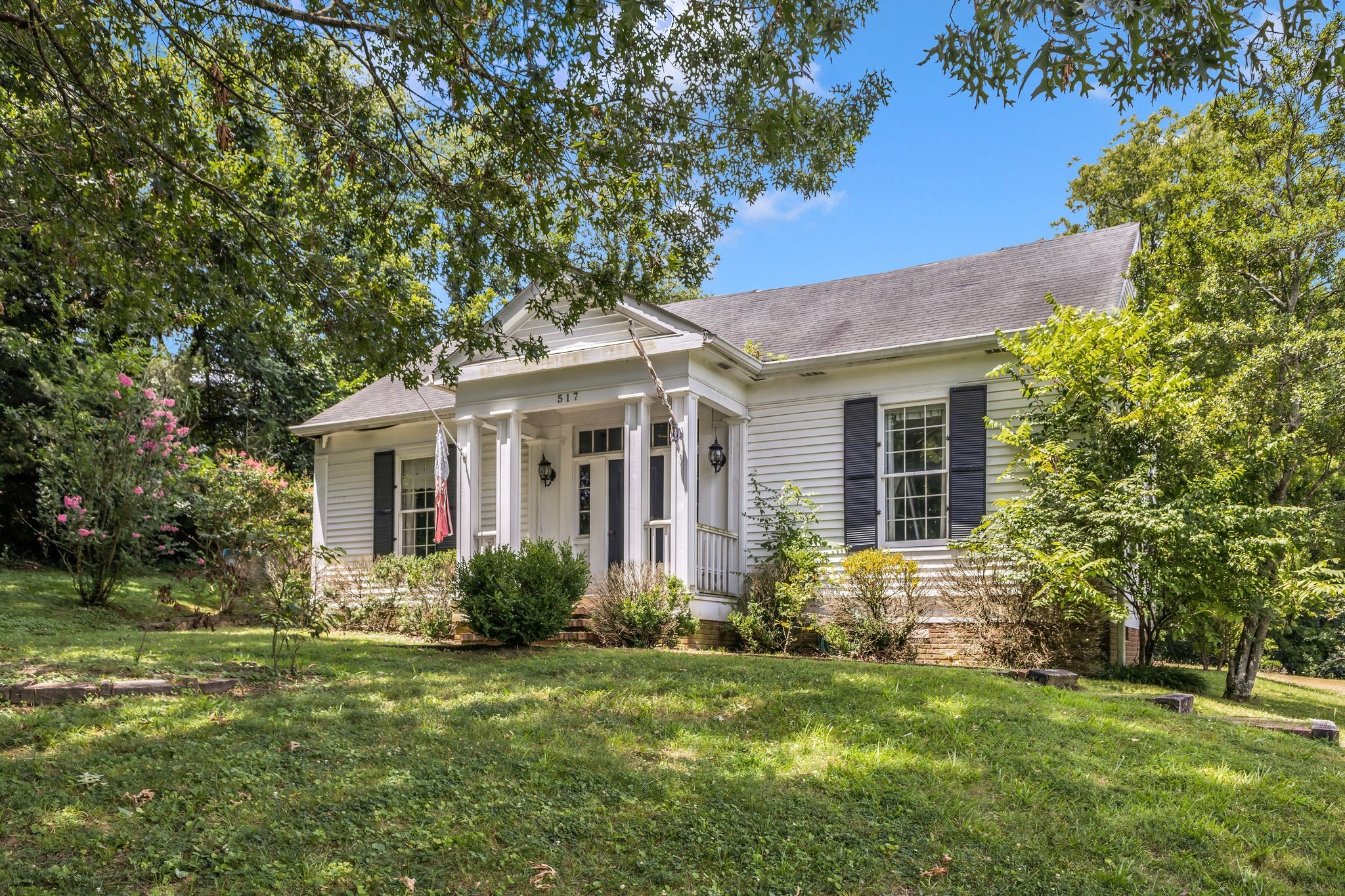 517 Franklin Road Franklin, TN 37069 - Photo 18 of 28 a front view of house with yard and green space