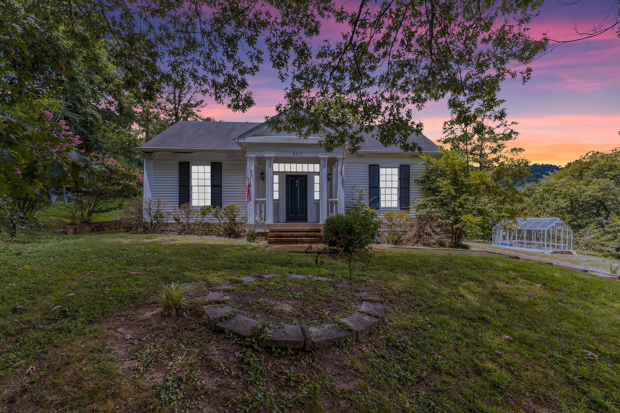 517 Franklin Road Franklin, TN 37069 - Photo 19 of 28 a front view of a house with garden