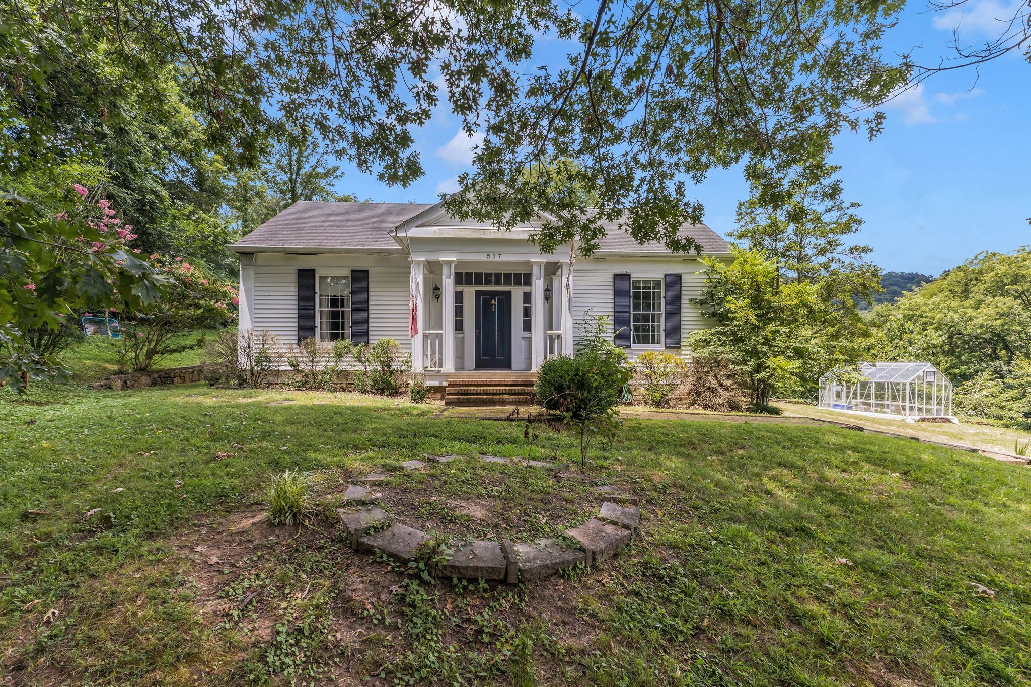517 Franklin Road Franklin, TN 37069 - Photo 20 of 28 a front view of a house with garden