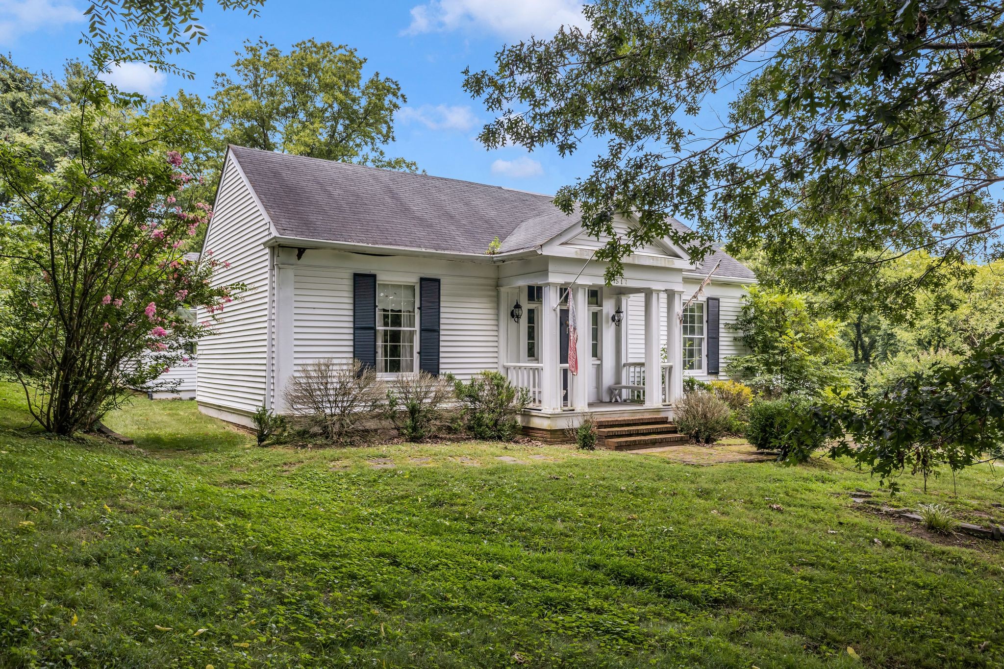 517 Franklin Road Franklin, TN 37069 - Photo 21 of 28 a front view of a house with garden