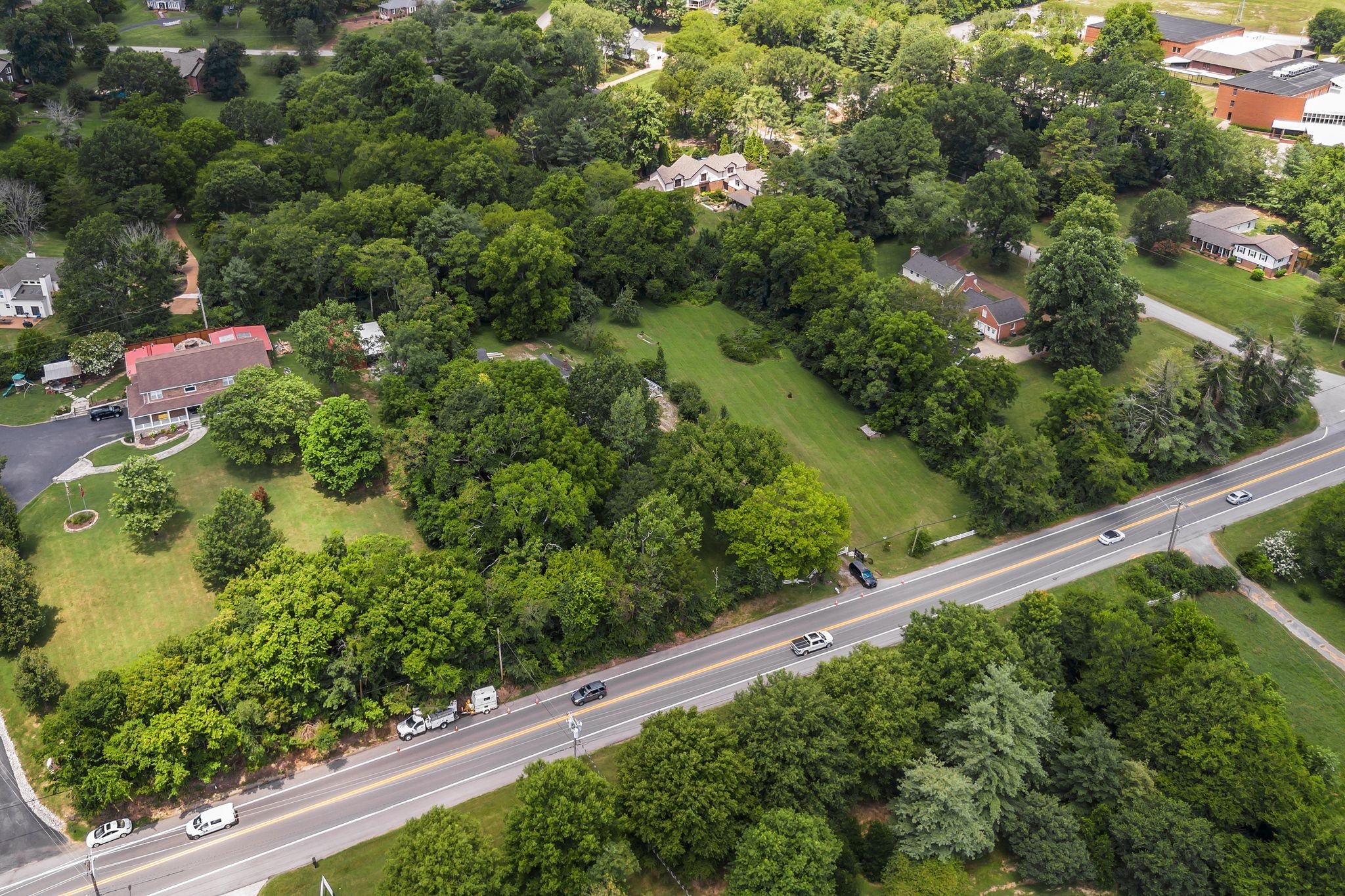 517 Franklin Road Franklin, TN 37069 - Photo 5 of 28 an aerial view of green landscape with trees in the background