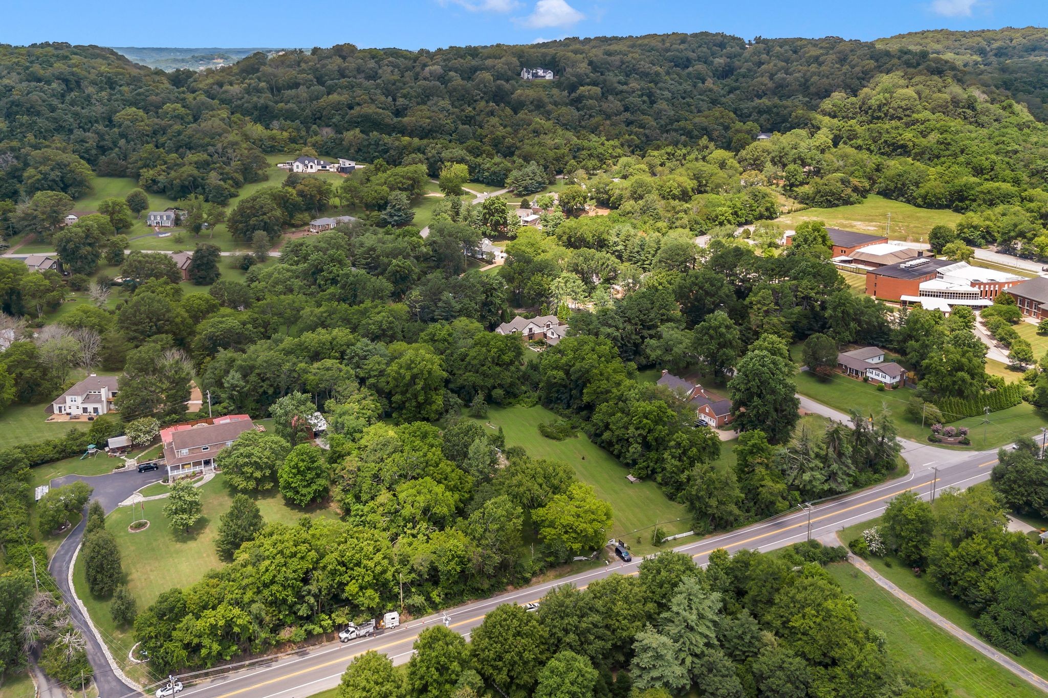 517 Franklin Road Franklin, TN 37069 - Photo 6 of 28 an aerial view of residential houses with outdoor space and trees