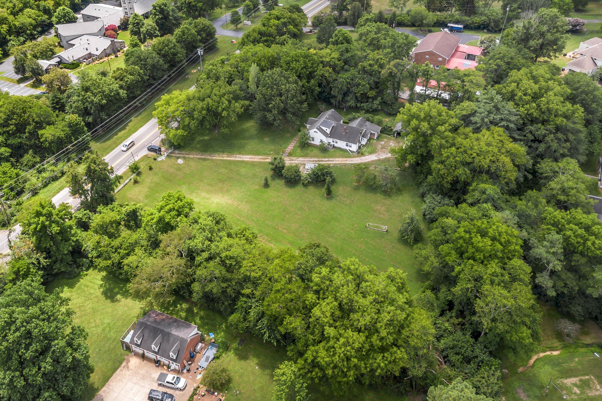 517 Franklin Road Franklin, TN 37069 - Photo 10 of 28 an aerial view of residential house with outdoor space and trees around