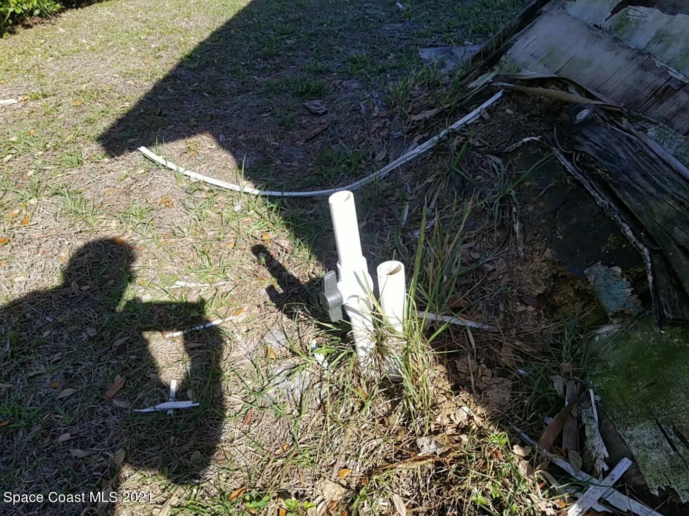 795 Raleigh Road Southeast, Unit 50 Palm Bay, FL 32909 - Photo 6 of 7 Pipes for irrigation