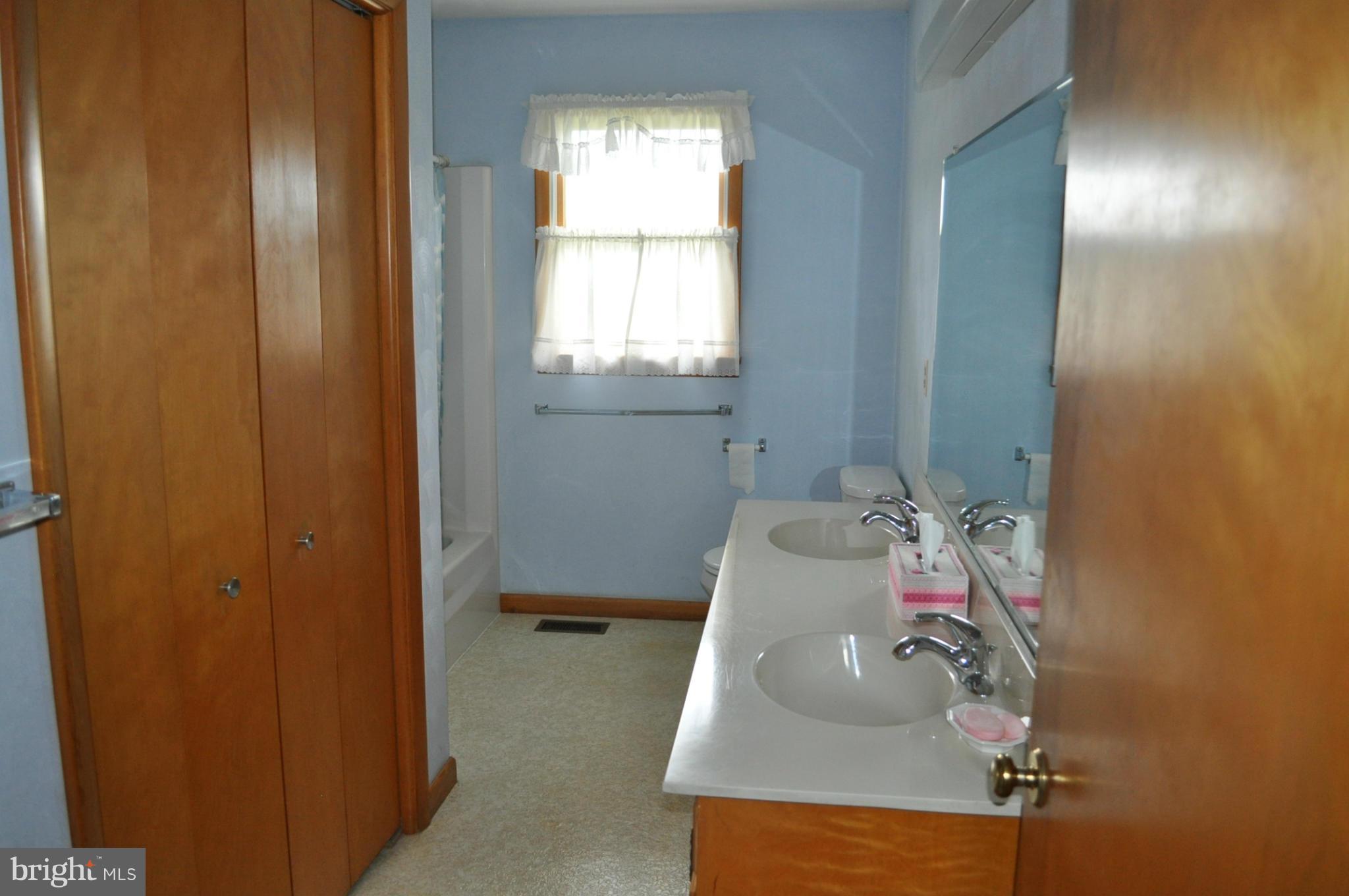 1201 Random Ridge Road Westminster, MD 21157 - Photo 14 of 17 1st floor bath has a laundry in the closet