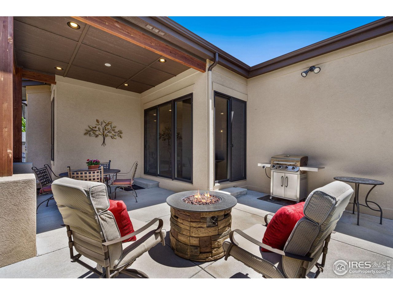 6611 Murano Drive Windsor, CO 80550 - Photo 32 of 35 a living room with furniture and a large window