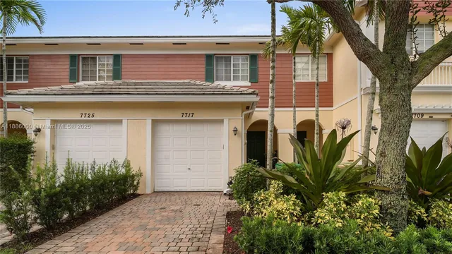 a view of a house with a small garden