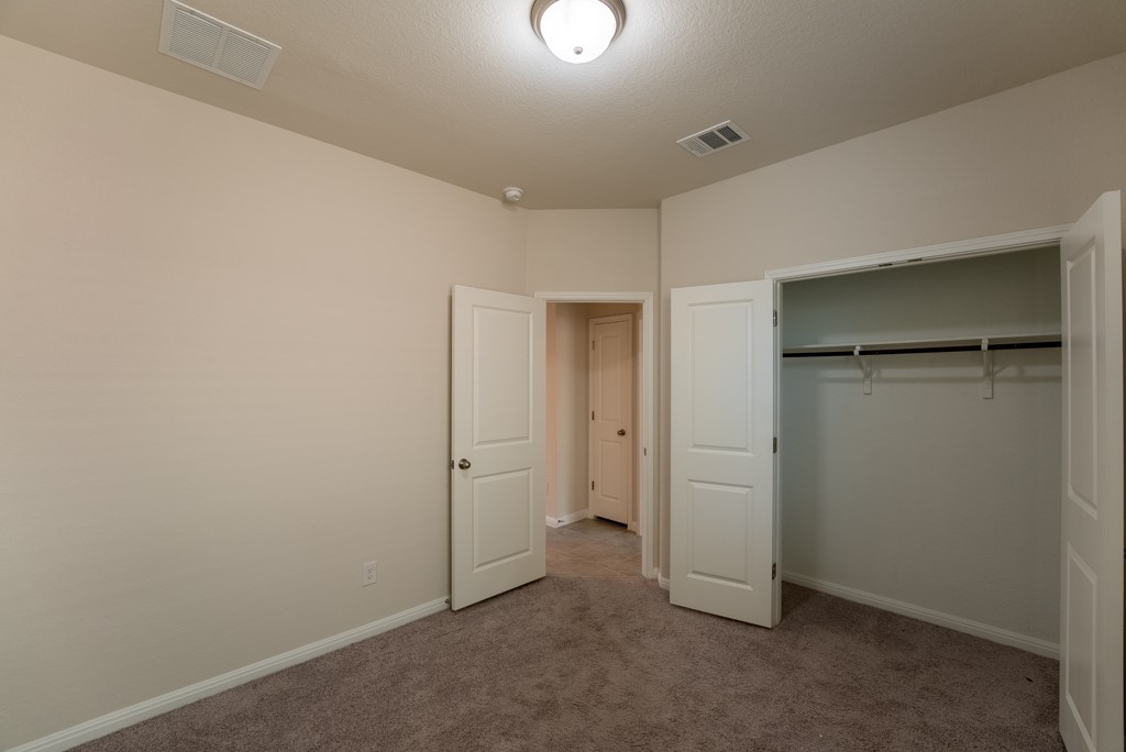 6310 Wolf Pack Drive Pflugerville, TX 78660 - Photo 23 of 33 a view of an empty room