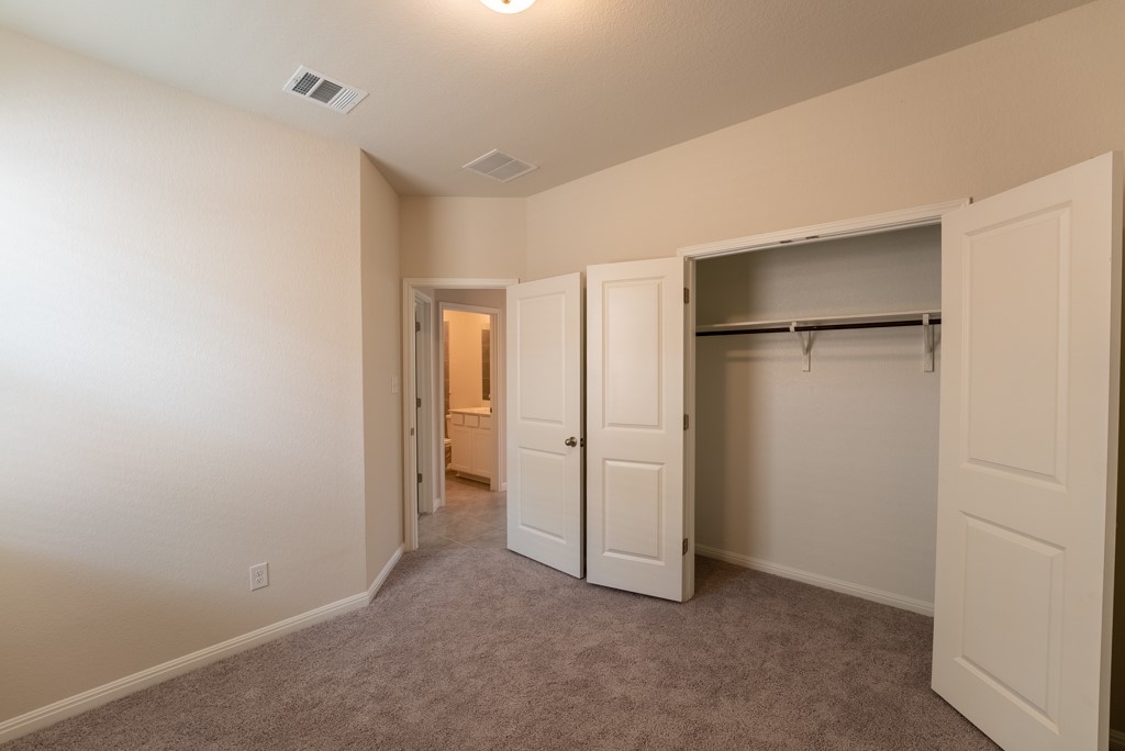 6310 Wolf Pack Drive Pflugerville, TX 78660 - Photo 27 of 34 a view of an empty room