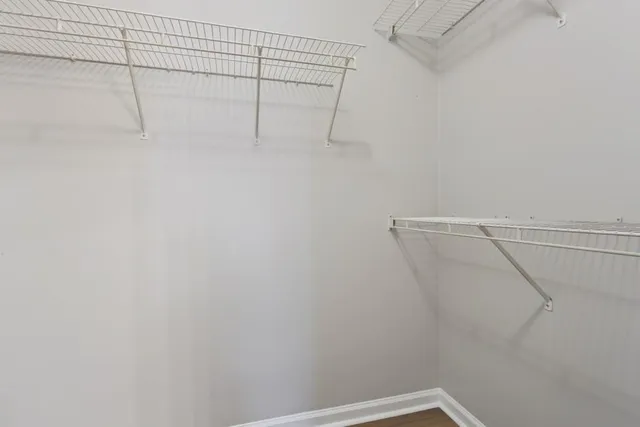 a view of a room with racks on the wall