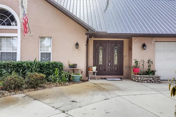 a front view of a house with a garage