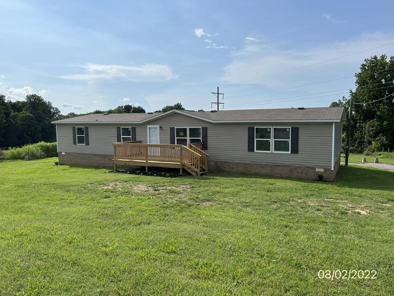 598 Key Road Troy, TN 38260 - Photo 1 of 25 a view of a house with a backyard