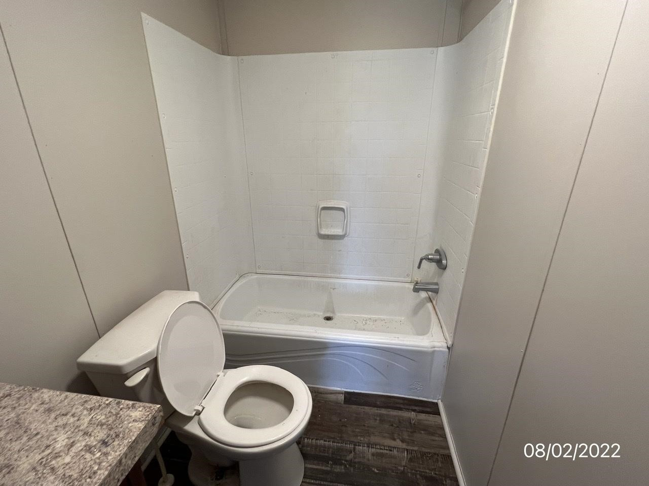 598 Key Road Troy, TN 38260 - Photo 13 of 25 a bathroom with a sink a toilet and a mirror