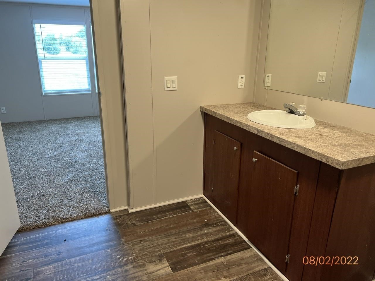 598 Key Road Troy, TN 38260 - Photo 19 of 25 a bathroom with a sink and a mirror