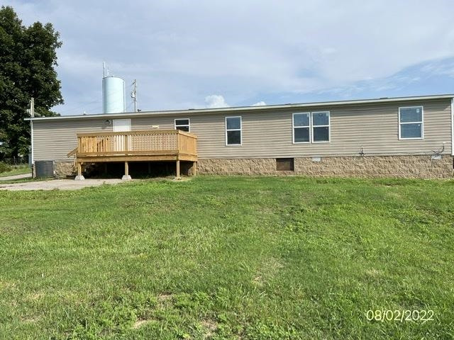 598 Key Road Troy, TN 38260 - Photo 3 of 25 a front view of house with yard and green space