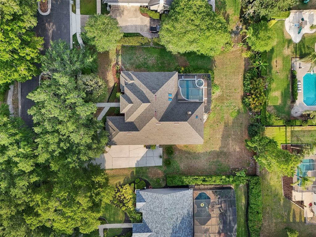 859 Windcrest Place Winter Springs, FL 32708 - Photo 1 of 1 an aerial view of a house with a garden