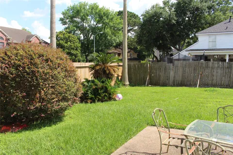 a view of yard with seating area and green space