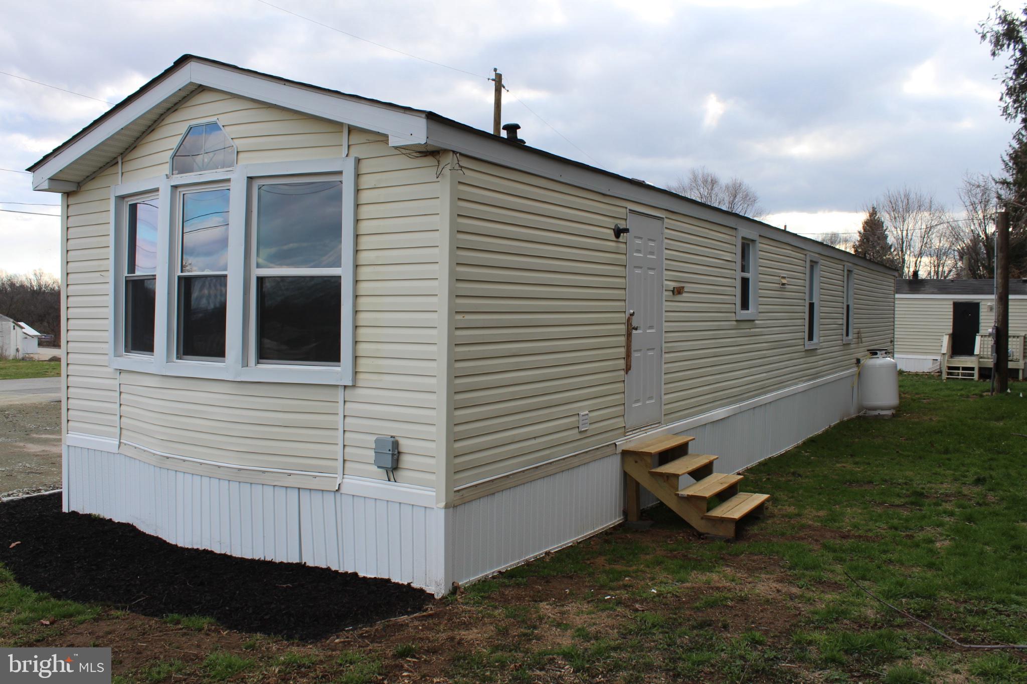 115 Santilli Road Landenberg, PA 19350 - Photo 4 of 15 Charming mobile home with inviting steps.