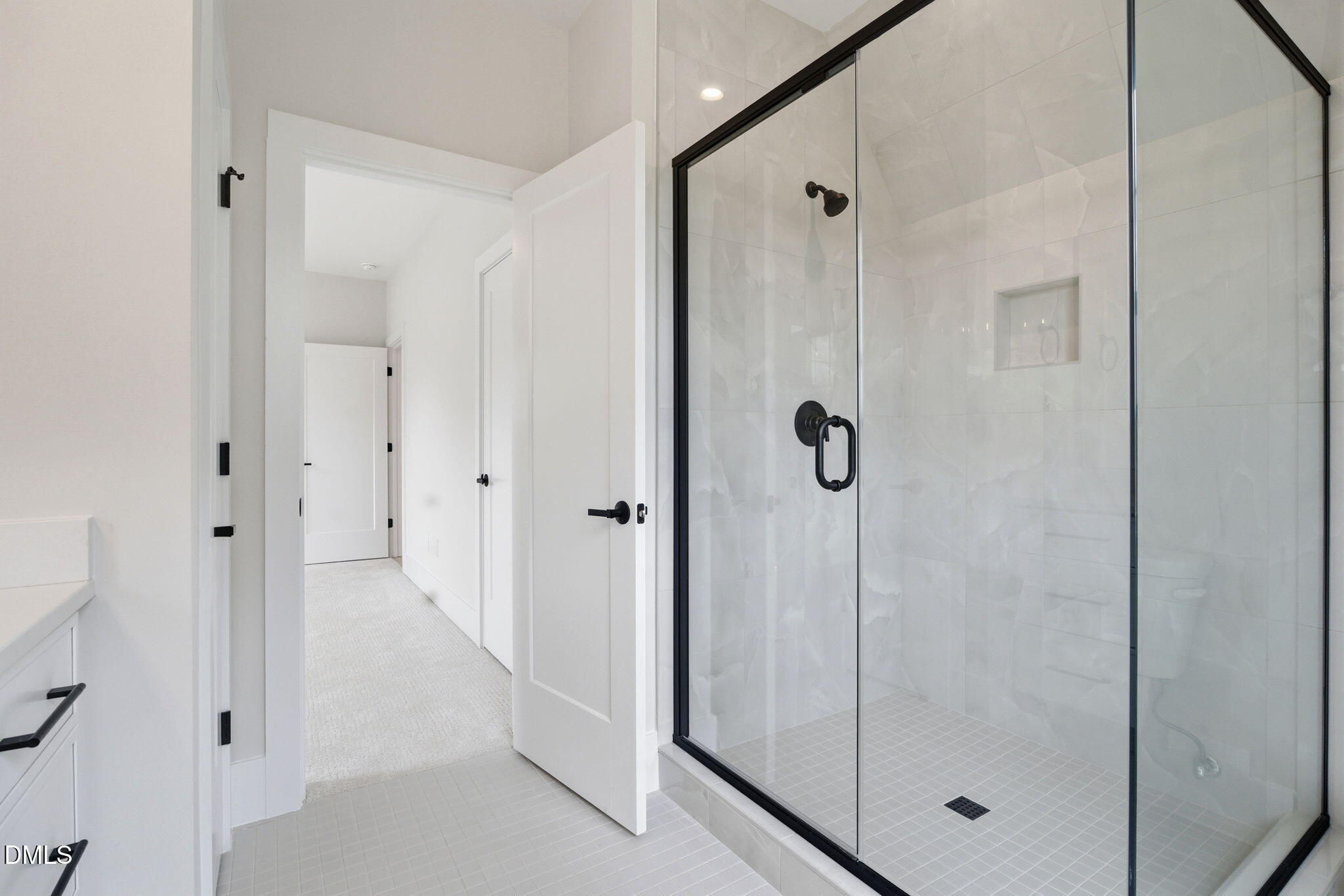 1304 Sanctuary Pond Drive Raleigh, NC 27606 - Photo 38 of 52 a bathroom with a shower