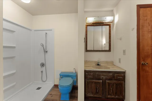 a view of a covered with snow in between of road