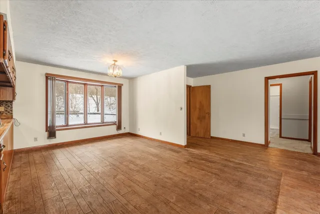 a view of a glass door and a window