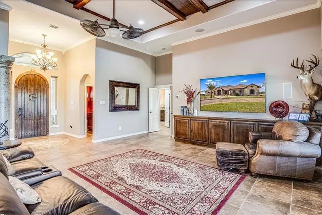 a living room with furniture and a rug