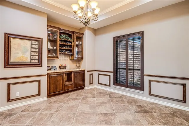 a view of a livingroom with furniture and a chandelier