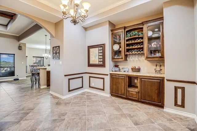 a bed room with a bed and a television