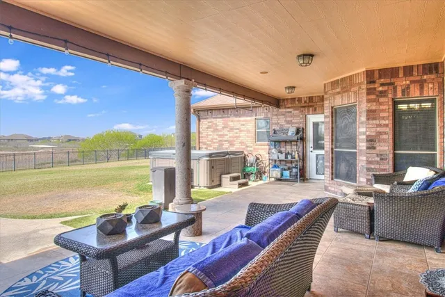 a outdoor space with patio the water view and ocean view