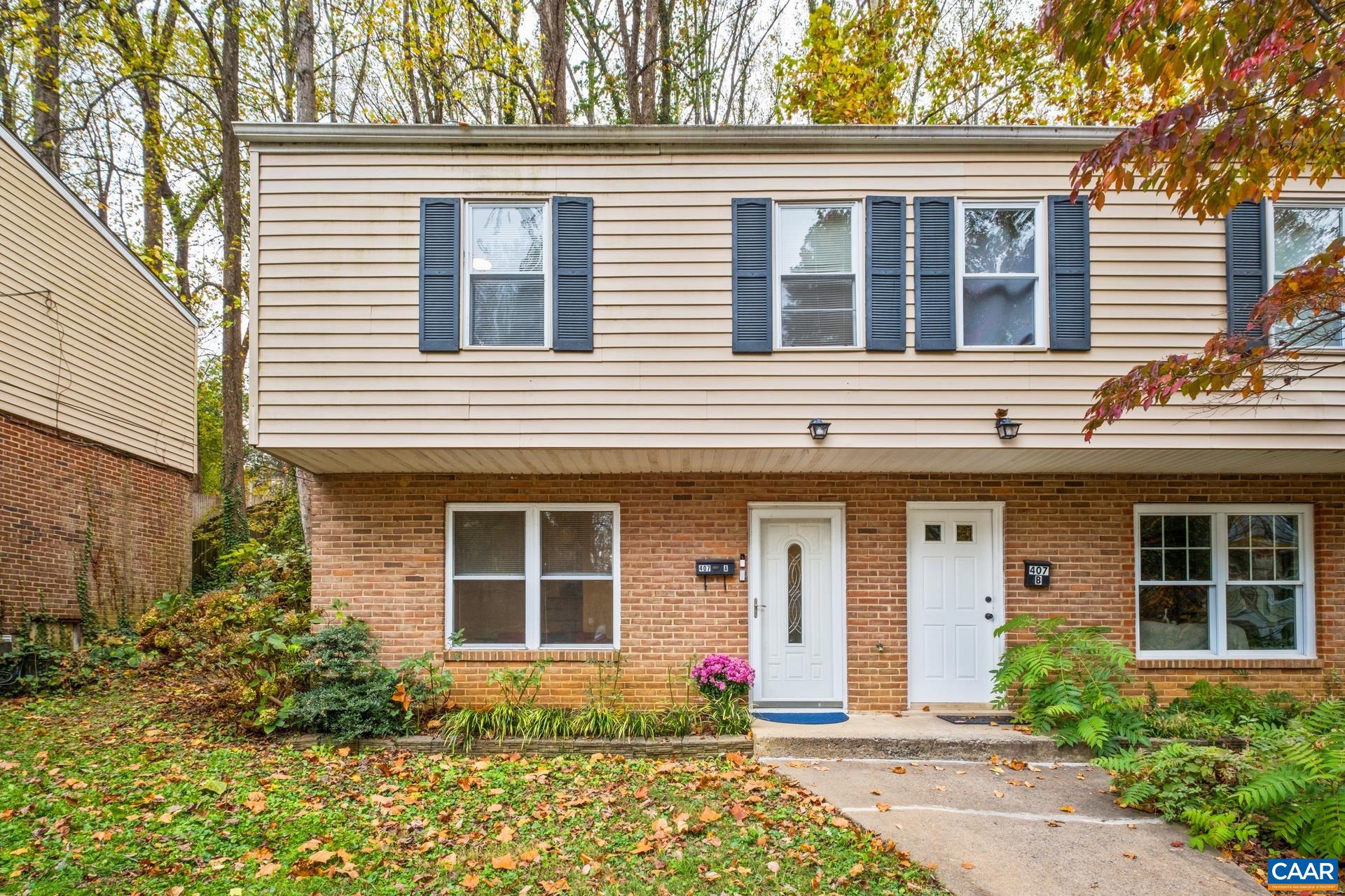 407 Valley Rd Extension, Unit A Charlottesville, VA 22903 - Photo 20 of 24 a front view of a house with yard