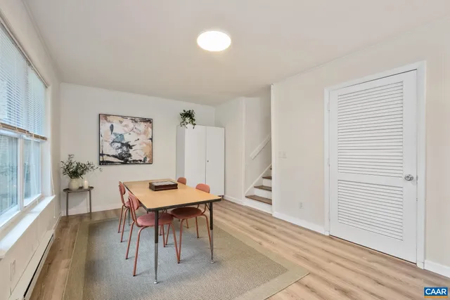 a view of a livingroom with furniture and window
