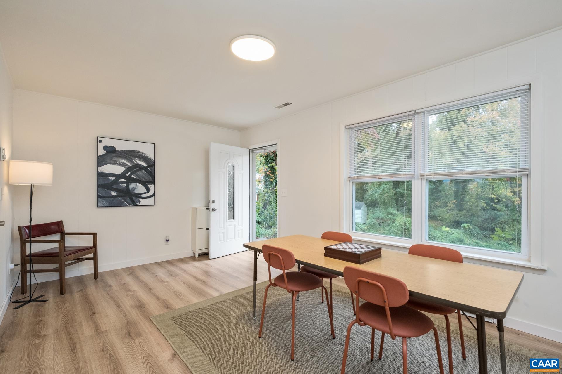 407 Valley Rd Extension, Unit A Charlottesville, VA 22903 - Photo 3 of 24 a view of a dining room with furniture window and outside view