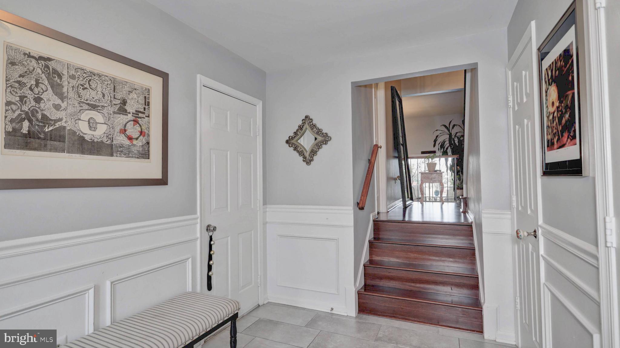 44072 Florence Terrace Ashburn, VA 20147 - Photo 14 of 31 a view of a hallway with interior of the house