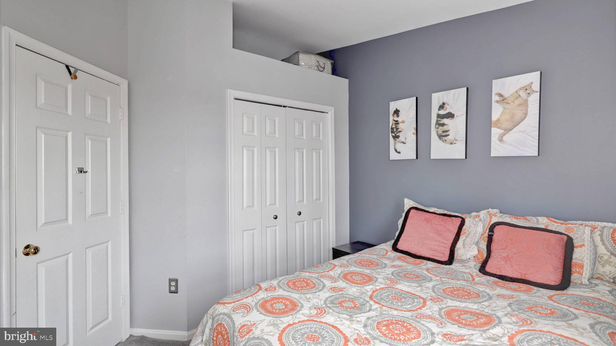 44072 Florence Terrace Ashburn, VA 20147 - Photo 23 of 31 a bedroom with a bed and hallway