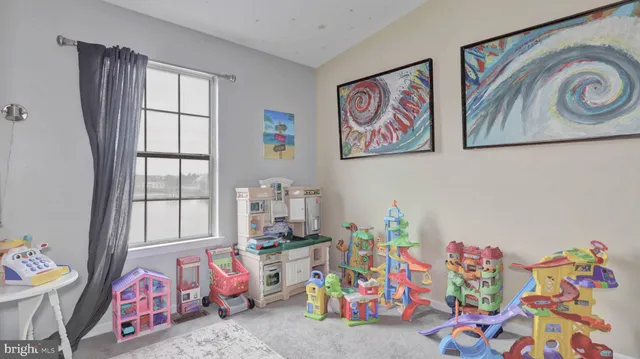a view of a chairs and table on the balcony